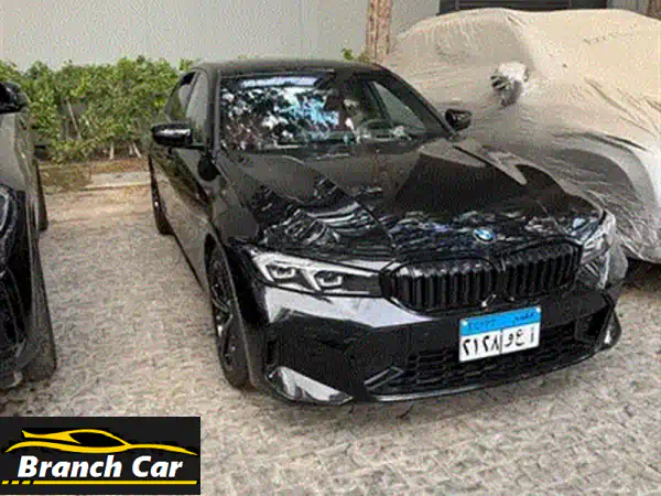 BMW 320i 2023 جديدة كلياً - أسود وأحمر - فرصة لا تُفوّت!