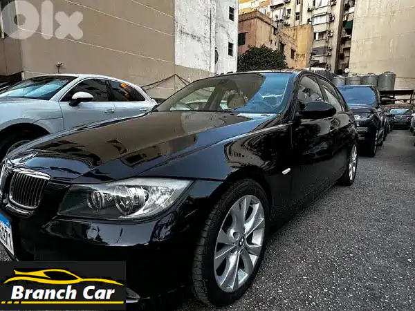 BMW 325 2006 أسود سبورت | بحالة الوكالة 0 حوادث | إطارات...