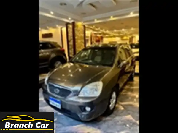 امتلك كيا كارينز 2010 خليجي: شاشة، كاميرا، جلد،...
