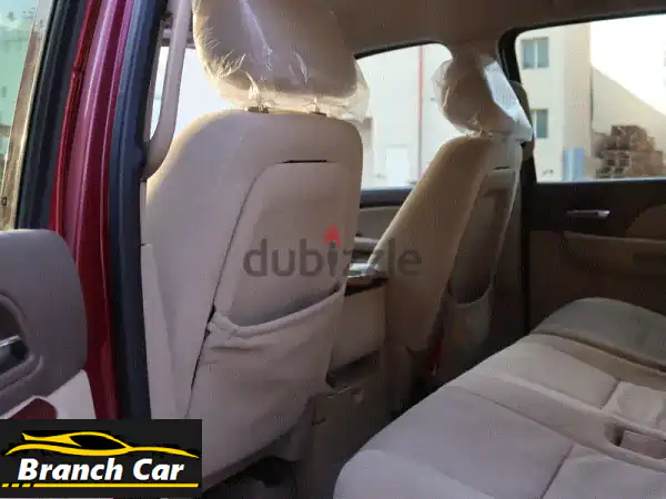 GMC Yukon 2009 أحمر للبيع: SUV فخمة وقوية بحالة ممتازة - جاهزة للانطلاق!