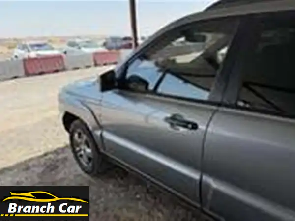 كيا سبورتاج 2007 للبيع بالدوحة: اعتمادية وسعر لا يُقاوم في قطر! | سيارة دفع رباعي عملية