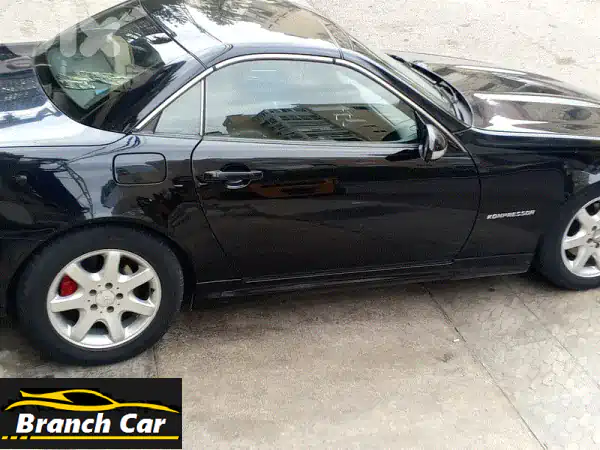 مرسيدس بنز SLK 2002 سوداء: أناقة كلاسيكية بحالة الوكالة...