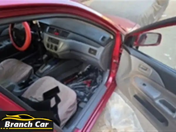 ميتسوبيشي لانسر بومة 2005 للبيع: رخصة سارية لـ 2028 وفابريكا سقف وشنطة | اعتمادية وأداء لا يُضاهى!