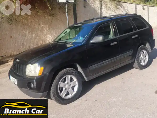 جيب جراند شيروكي 2005 لاريدو سوداء: قوة، راحة،...