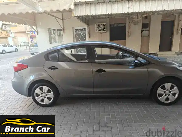 كيا سيراتو 2015 رمادي: جاهزة للانطلاق! صيانة ممتازة وفحص وتأمين ساريان.