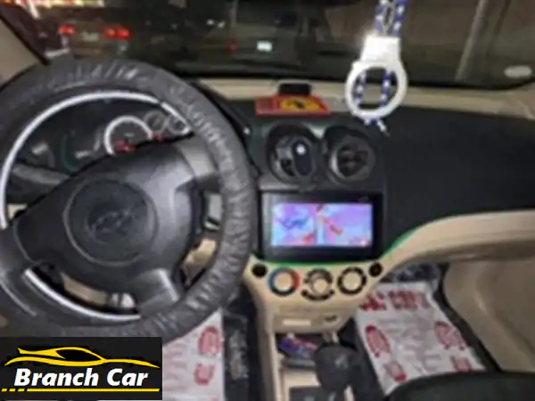 امتلك شيفروليه أفيو 208 أوتوماتيك: فابريكا دواخل وسقف | مالك أول | صيانة شاملة | جاهزة للانطلاق بأداء لا يضاهى!