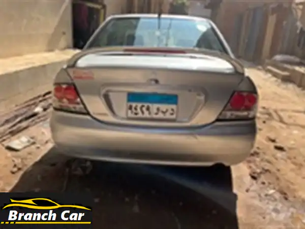 فرصة لا تعوض: ميتسوبيشي لانسر بومة 2008 أوتوماتيك (1300cc) - فابريكة سقف وشنطة وجاهزة للانطلاق!