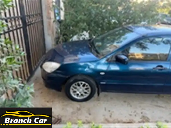 لؤلؤة نادرة: ميتسوبيشي لانسر 2005 فابريكة بالكامل | 61 ألف كم فقط! | موفرة وراقية