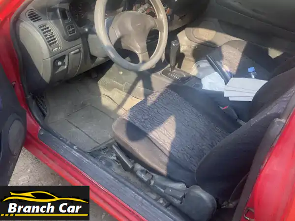 فرصة مميزة: ميتسوبيشي كولت 2001 حمراء فل أوبشن للبيع | سيارة اقتصادية وموثوقة بحالة ممتازة!