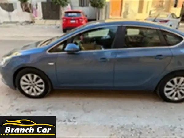 أوبل أسترا 2016 Enjoy Plus الفئة الأعلى للبيع: فابريكا بالكامل، صيانات توكيل وفواتير! كفرات 2024 وجاهزة للانطلاق