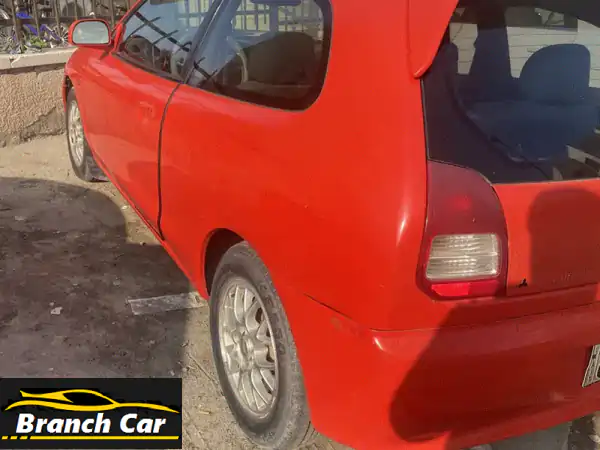 فرصة مميزة: ميتسوبيشي كولت 2001 حمراء فل أوبشن للبيع...