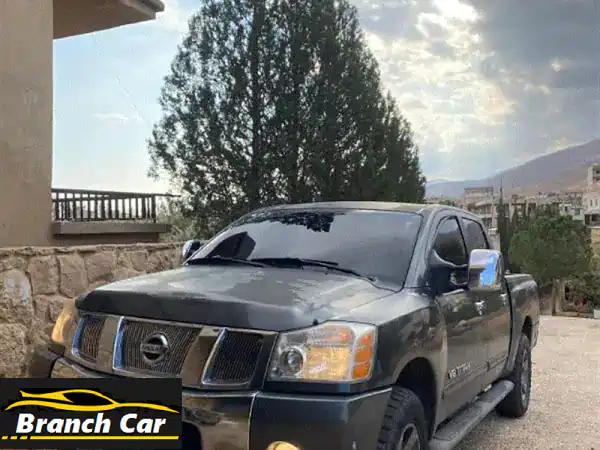 امتلك القوة الأسطورية: نيسان تيتان 2005 V8 5.6 LE فضي -...