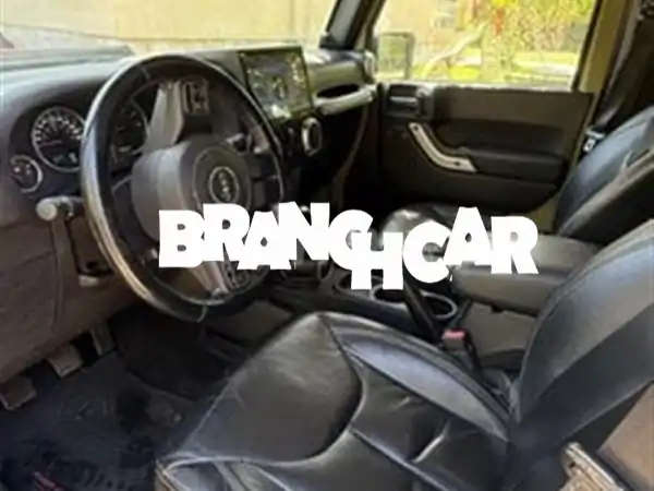 جيب رانجلر صحارى 2015: مغامرة أحلامك بانتظارك! (مانيوال، جلد، صيانة دورية)