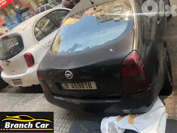 فرصة مميزة: شيفروليه أوبترا 2004 للبيع - مظهر خارجي رائع ولون أزرق كحلي!