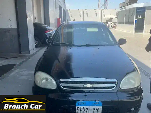 فرصة لا تعوض! شيفروليه لانوس 2009 سوداء بحالة ممتازة...