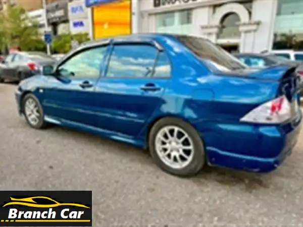 ميتسوبيشي لانسر بومة 2007 للبيع: فابريكا دواخل، رخصة سنتين، وتكييف ثلاجة! (حالة استثنائية)