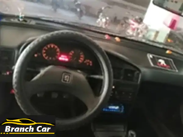 فرصة ذهبية: بيجو 405 موديل 1996 - بنزين وغاز طبيعي ومجددة بالكامل! جاهزة للانطلاق.