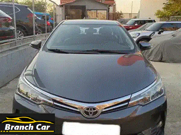 تويوتا كورولا 2015 بيضاء (فل كامل) - مالك واحد، 0 حوادث، شاشة أندرويد وفتحة سقف! اغتنم الفرصة