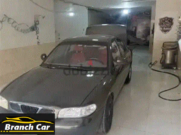 دايو نوبيرا 2003 الرمادية: فبريكا دواخل، غاز وبنزين، وجاهزة للطريق!