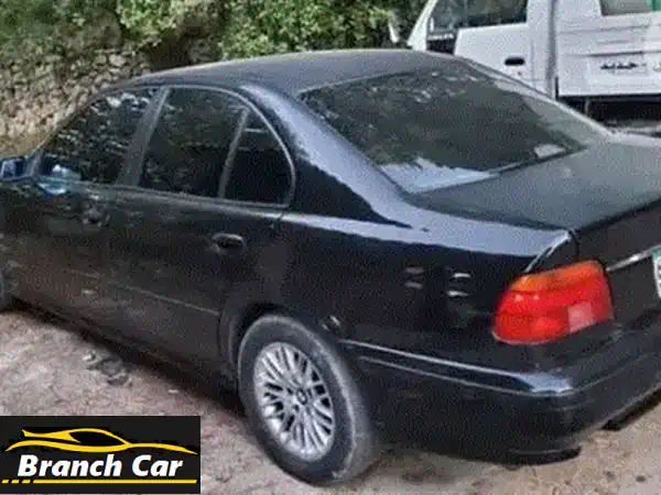 🔥 فرصة استثنائية! BMW 5 Series 1995 كلاسيكية بمحرك جديد وجير عادي - للبيع المستعجل (أسود جذاب)