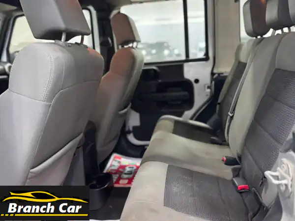 جيب رانجلر ساهارا 2010 الفضي: أيقونة المغامرة الجاهزة للانطلاق في البحرين!