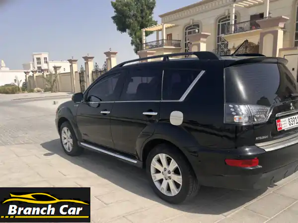 ميتسوبيشي أوتلاندر 2012 للبيع: دفع رباعي فاخرة بفتحة...