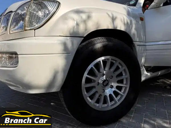 فرصة ذهبية: لكزس LX470 استيشن 2002 خليجي - نظافة وكالة، جاهزة للمغامرة بسعر 29,500 درهم!