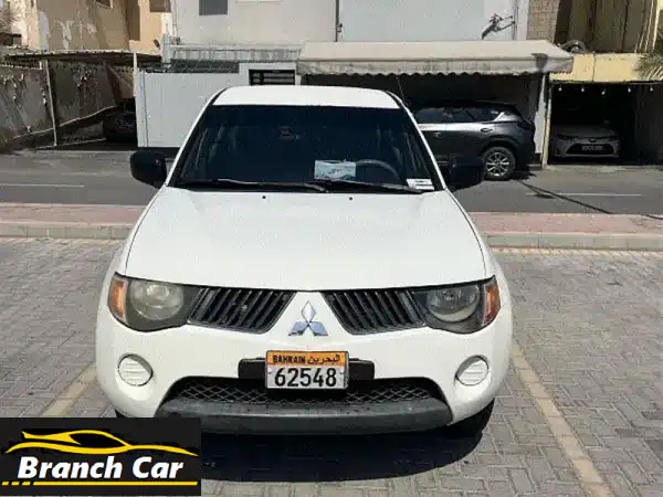 ميتسوبيشي L200 2007 بيضاء - بحالة ممتازة! فرصة لا تُفوّت!