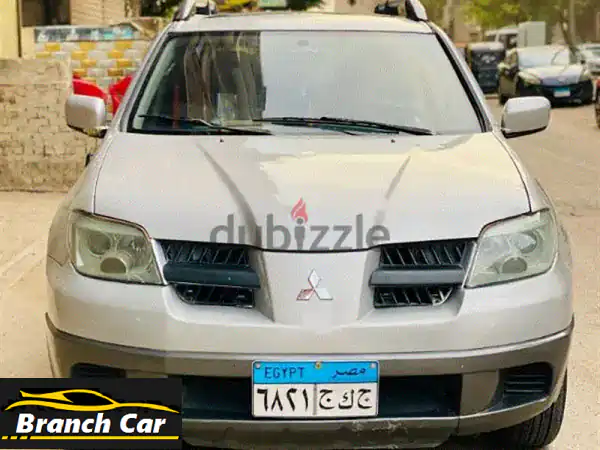 ميتسوبيشي أوتلاندر 2003 بحالة ممتازة! فرصة لا تُفوّت!