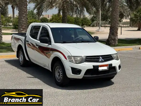 ميتسوبيشي L200 2014 بيضاء - فرصة لا تُفوّت! (سعر...