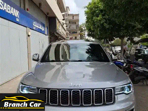 جيب جراند شيروكي 2014 لاredo بحالة ممتازة - فرصة لا تُفوّت!