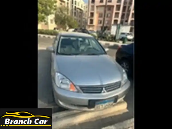 لانسر بومة 2013 بحالة ممتازة - فرصة لا تُفوّت!