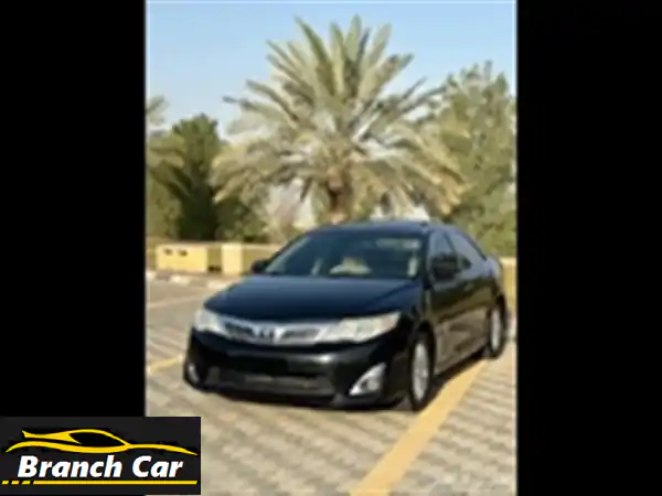 تويوتا كامري 2014:  أداءٌ استثنائي يتجاوز الحدود! 🚗