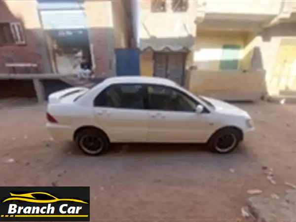 ميتسوبيشي لانسر 2002 بحالة ممتازة! (فابريكا، رشة بسيطة)