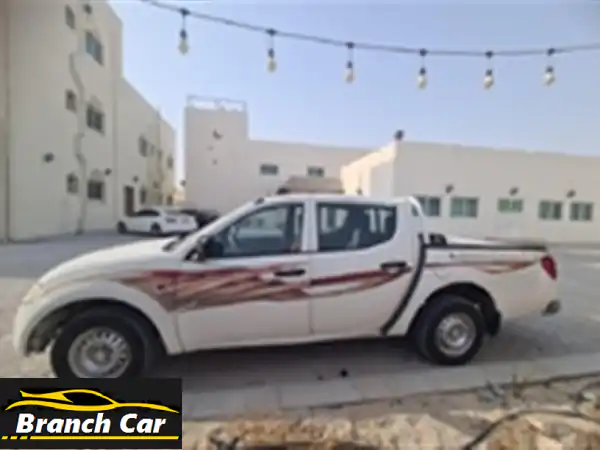 ميتسوبيشي L200 2009 - دبل كبينة بحالة ممتازة!  (13,000 درهم فقط)