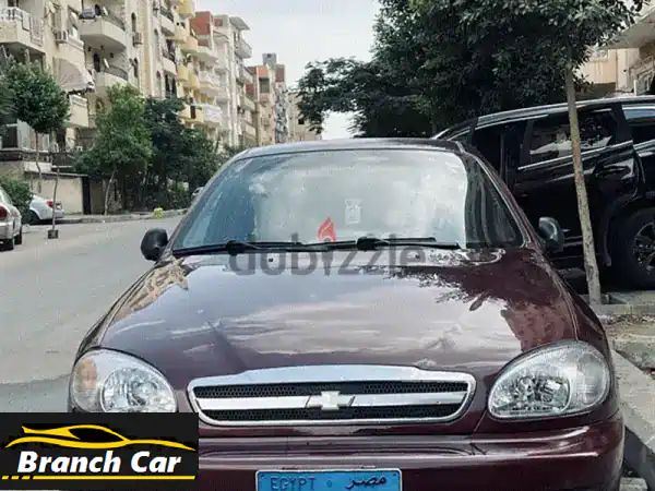 شيفروليه لانوس 2015 أحمر فابريكا بحالة ممتازة - فرصة...