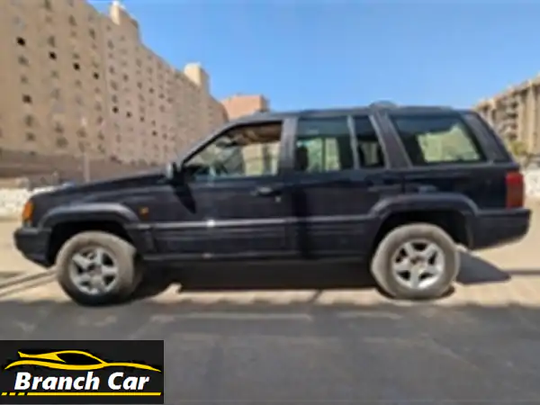 جيب جراند شيروكي 1998 - قطعة نادرة للبيع في الهرم! (سعر مغرٍ)