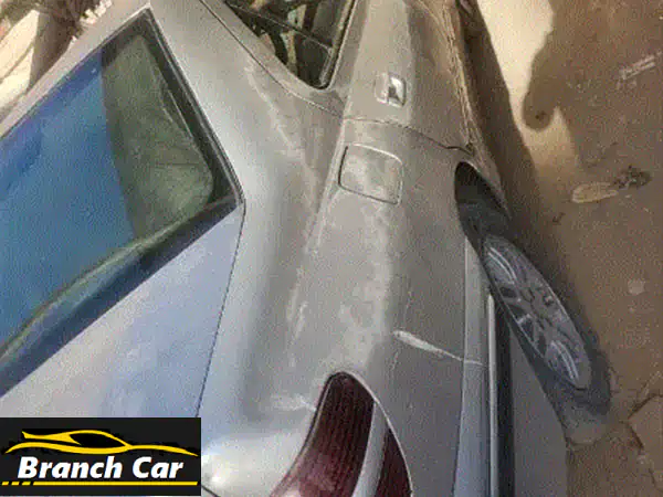 بيجو 2002 فضي - حالة ممتازة! (معظمها فابريكا)