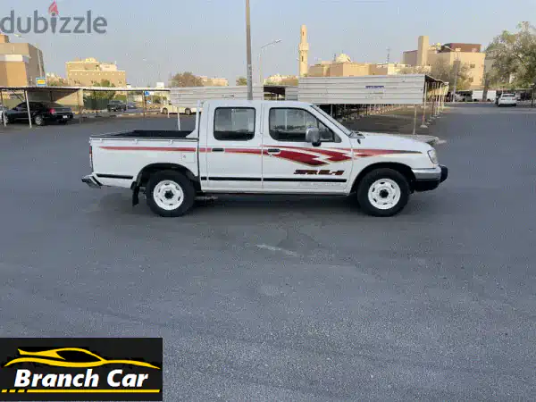 نيسان بيك أب 2002 - بيضاء بحالة ممتازة! فرصة لا تُفوّت