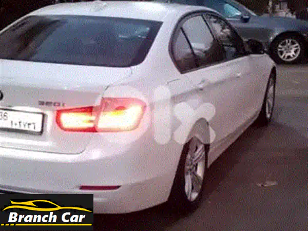 بي إم دبليو 320i F30 (2015) بيضاء - سيارة فاخرة بحالة...