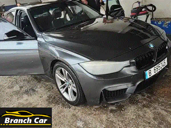 BMW 320i Luxury 2013 - أسود على أسود، كاملة المواصفات، بحالة ممتازة!