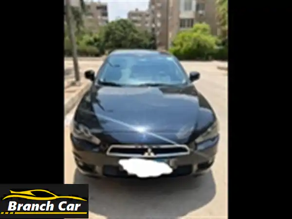 ميتسوبيشي لانسر EX 2015 ✨ بحالة ممتازة!...