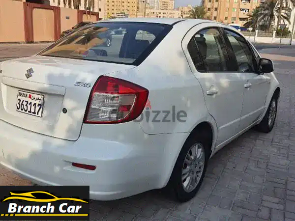 سوزوكي SX4 موديل 2009 - بيضاء، بحالة ممتازة!  سعر مميز!