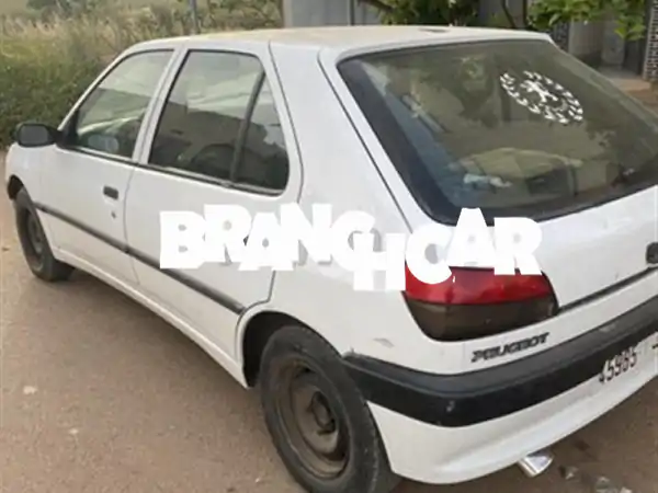 بيجو 306 موديل 1995 بحالة ممتازة - فرصة لا تُفوّت!