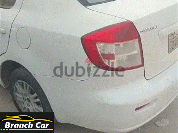 سوزوكي SX4 2014 بيضاء - بحالة ممتازة! فرصة لا تُفوّت