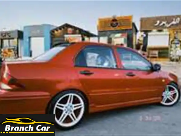 لانسر مكوة 2001 بحالة ممتازة - فرصة لا تُفوّت!