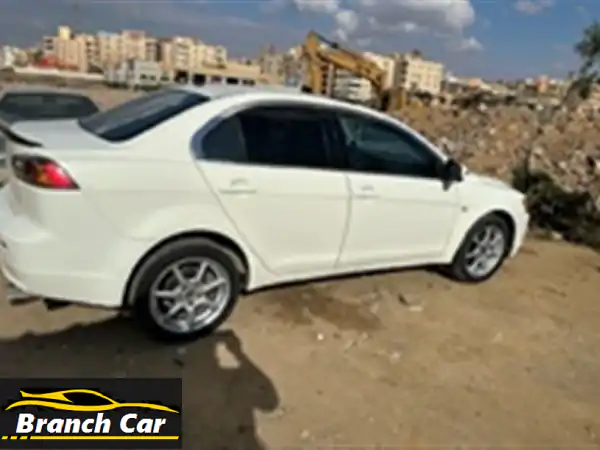 ميتسوبيشي لانسر EX 2016 بحالة ممتازة - لون جديد!...