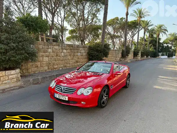 مرسيدس SL 500 (2003) - أحمر فاخر، حالة ممتازة، فرصة لا تُفوّت!