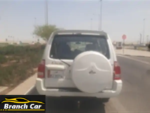 ميتسوبيشي باجيرو 2003 بحالة ممتازة! ✨ (سقف بانورامي، خيارات كاملة)