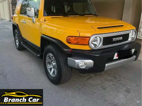 تويوتا FJ Cruiser 2016 صفراء - بحالة ممتازة! (جميع...